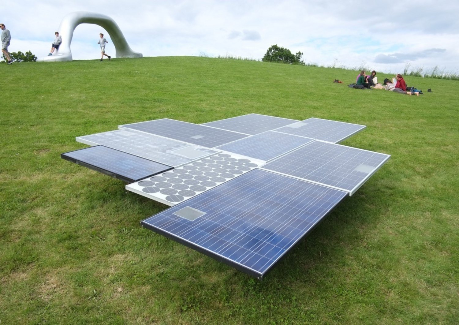 solar panels on the grass in a park