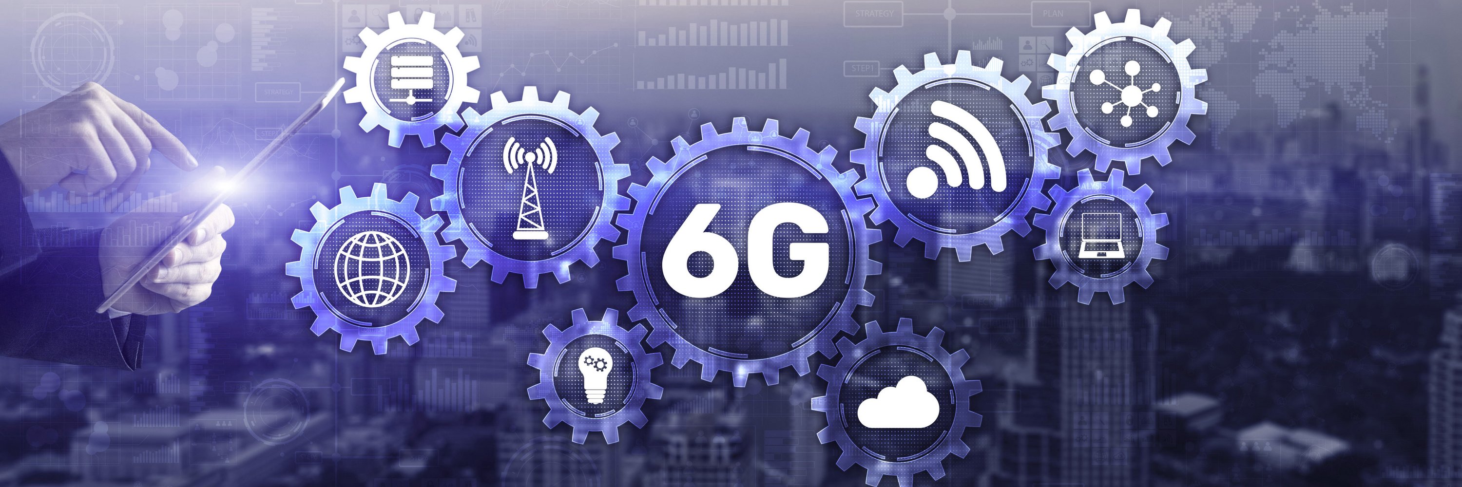 Stockfoto with different gears. In the biggest one in the middle "6G" is written. Around are icons such as a cloud, a network, a globe etc.