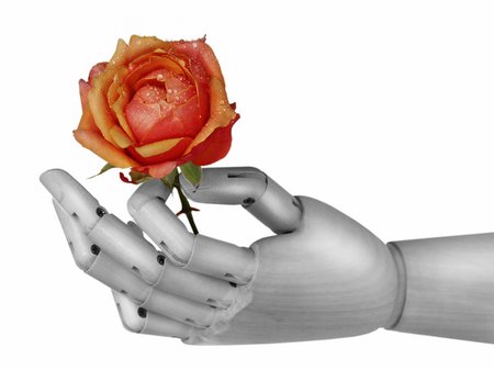 robot hand holding a red rose