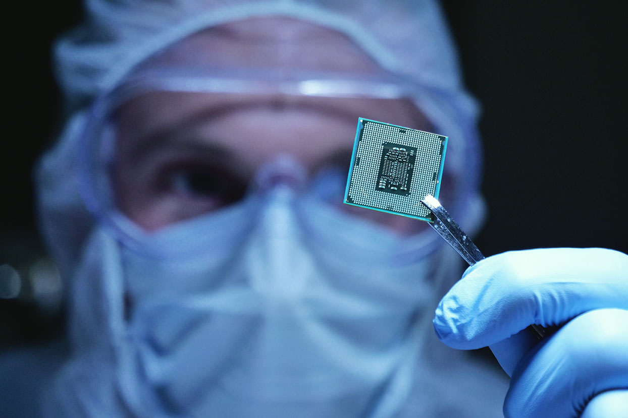 A close-up of a chip being held by a researcher 